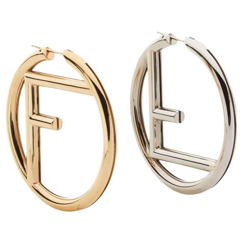 fendi gold hoop|Fendi earmuffs.